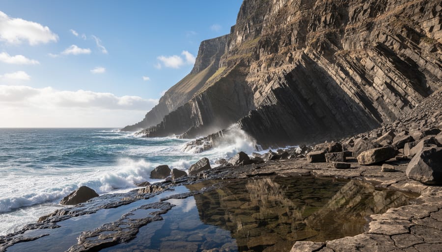 Moody view of a Canadian coastal seacliff with rough ocean under an overcast sky